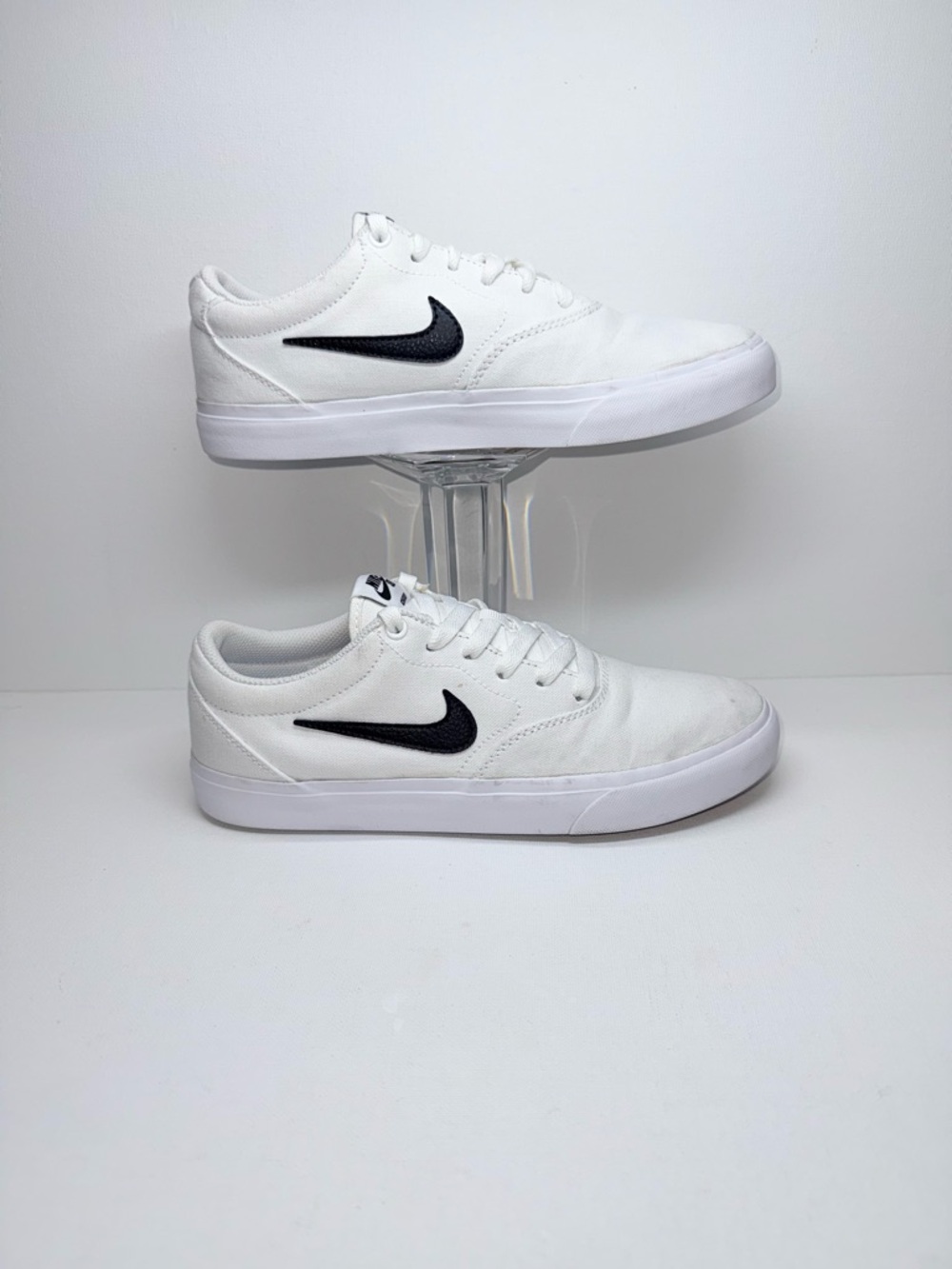 Nike SB Men’s White Canvas Sneakers with Black Swoosh